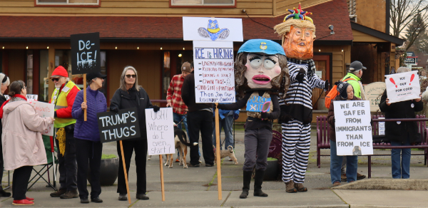 Line of protesters with signs